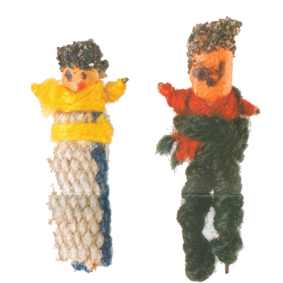 A male and female worry doll