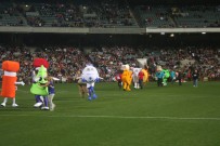 the mascots come out onto the field