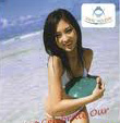 Close up on the cover of the Vmac pamphlet showing a girl playing in the ocean 