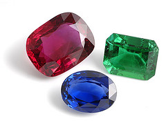 Three jewels; a ruby, an emerald and a sapphire 
