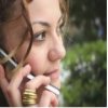 image of young woman on mobile phone. Image cutesy of ACCC